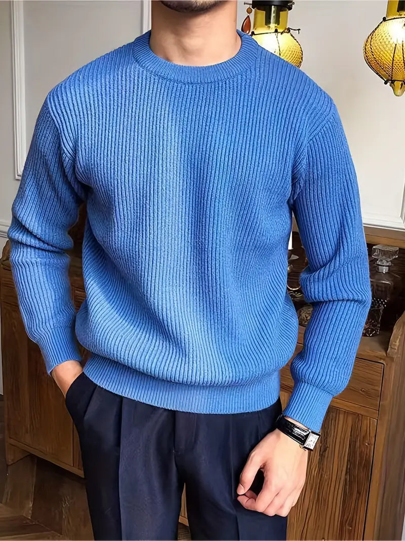 Warm men's crew neck knit sweater. Classic long sleeve style for comfortable cooler weather.