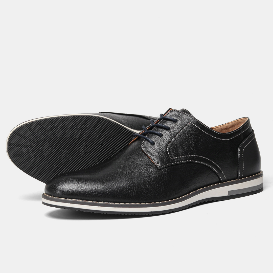 Men's classic black leather derby dress shoes, styled for a sharp, professional and elegant men's fashion look.