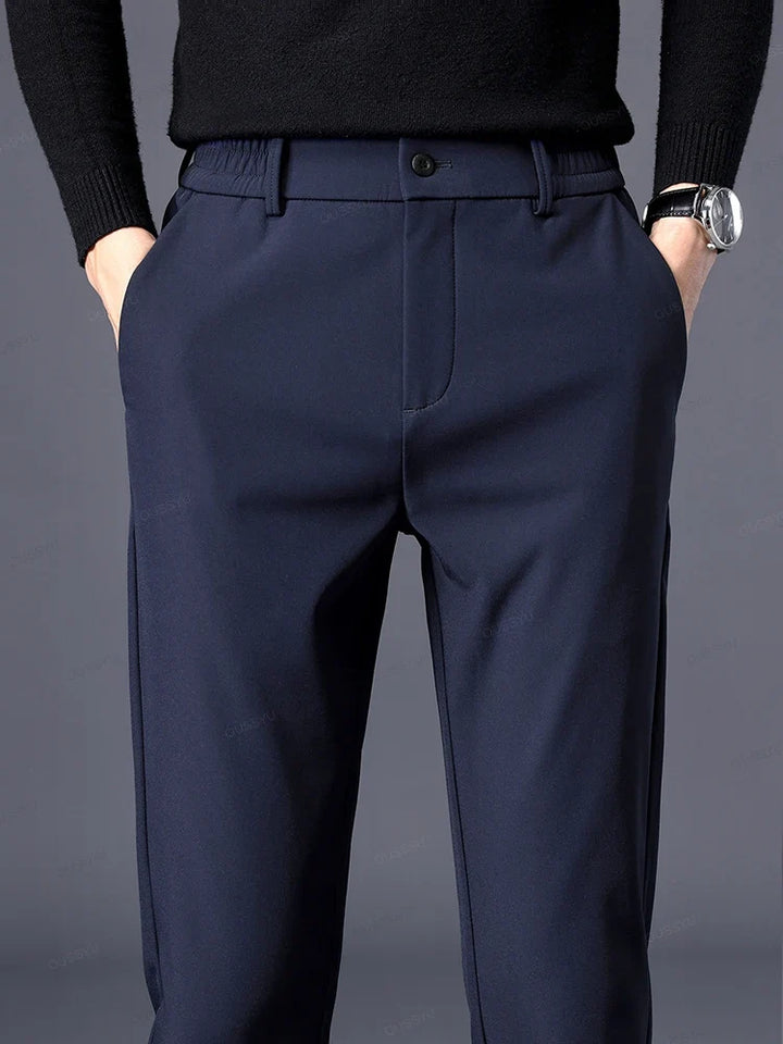 Navy blue men's classic fit dress pants, comfortable and tailored, perfect for professional or casual outfits.