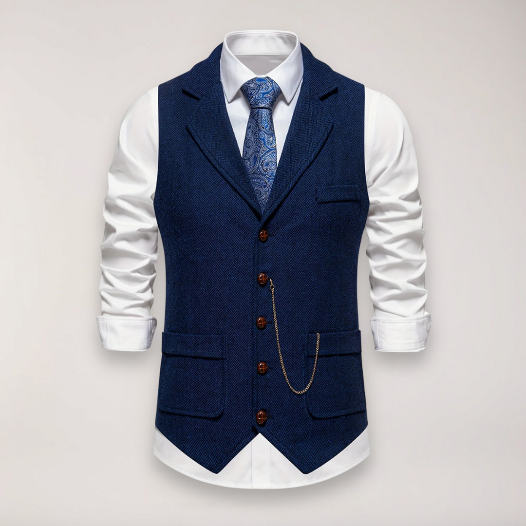 Detailed shot of a men's classic fit herringbone waistcoat fabric, showcasing the reversed collar and button closure.