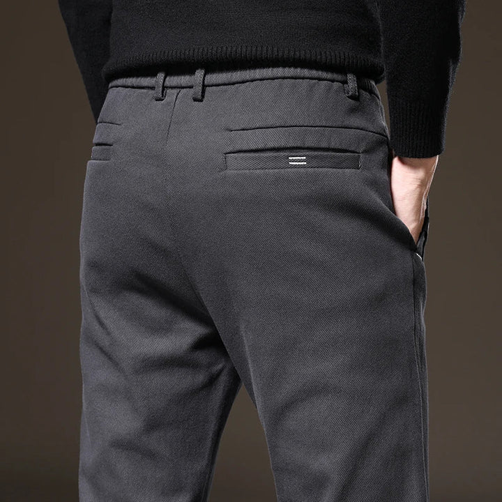 Stylish men's classic fit pants, designed with stretch fabric for ultimate comfort and flexibility.