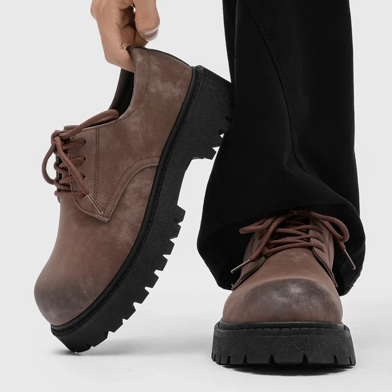 Black men's classic Foundry Derby shoes, offering sophisticated and bold style for modern fashion.