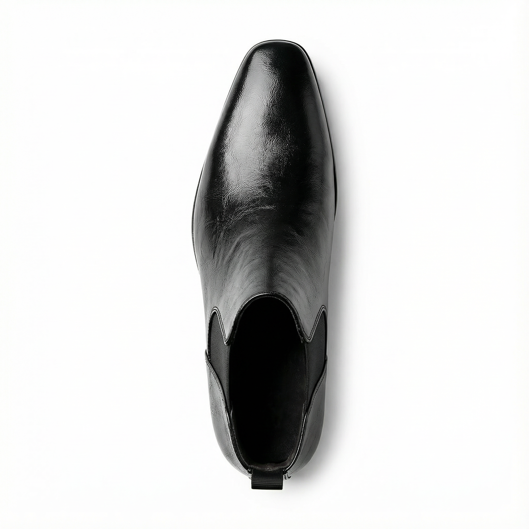 Men's full-grain leather Chelsea boots, elegant slip-on ankle style, perfect for sophisticated casual or dress looks.