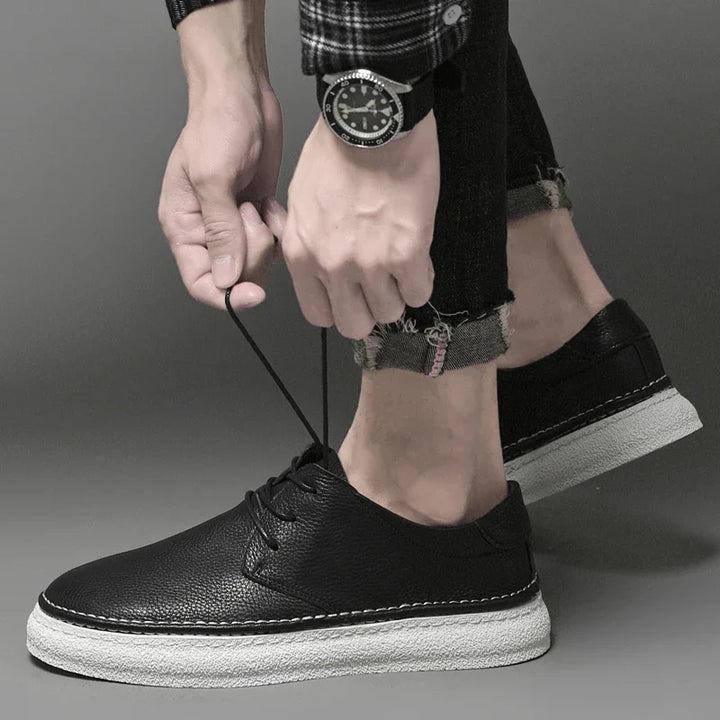 White genuine leather men's Oxford shoes, a classic lace-up design for stylish dress or comfort.