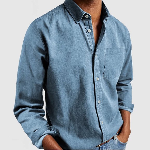 Man wearing a classic long sleeve button-up shirt, styled casually for an everyday versatile menswear look.