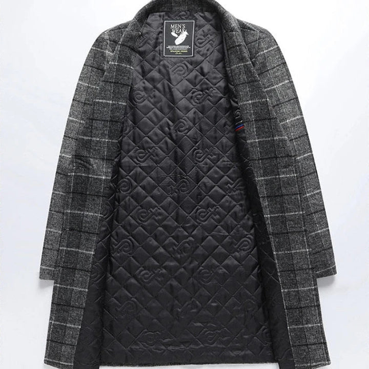 Warm, long men's plaid overcoat, perfect classic style for winter gentleman's fashion.