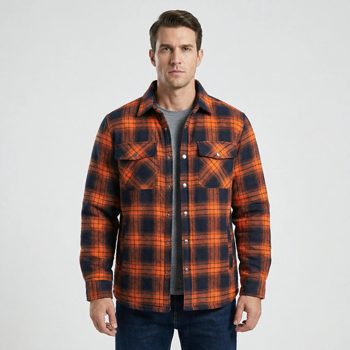 Stylish men's fall/winter plaid quilted jacket. Casual outdoor lumberjack style with warm quilting & snap closure.