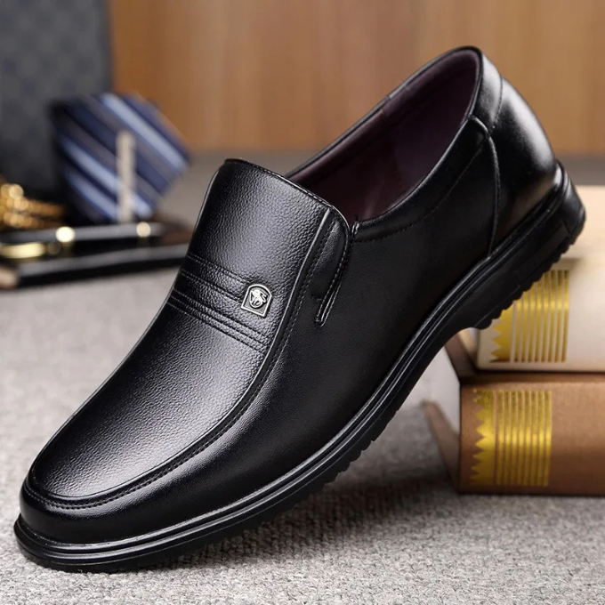 Stylish brown slip-on dress shoes for men, versatile and comfortable for any elegant occasion.