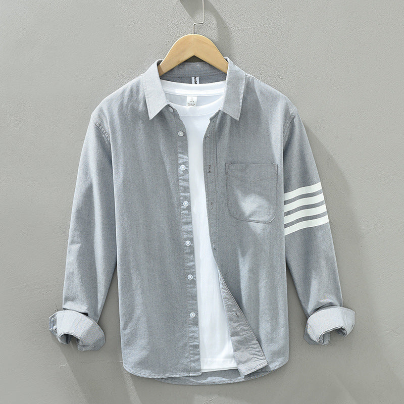 Stylish black long-sleeve striped shirt for men, a classic casual top perfect for smart everyday wear.