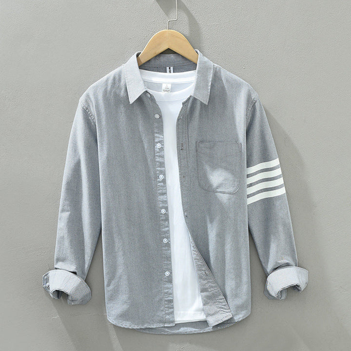 Stylish black long-sleeve striped shirt for men, a classic casual top perfect for smart everyday wear.