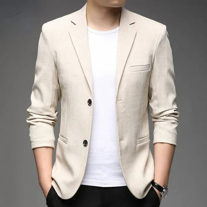 Stylish men's tailored blazer in charcoal, a versatile layering piece for smart casual or professional outfits.