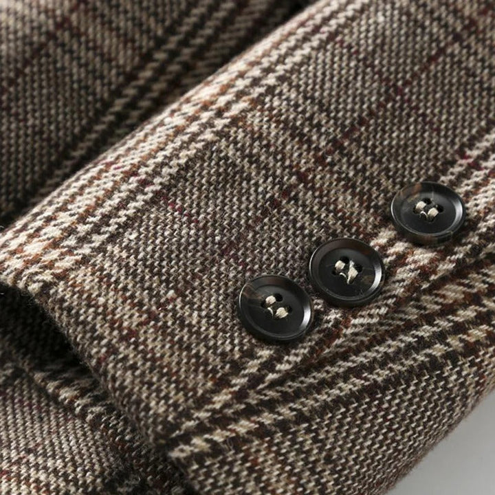 Stylish men's tailored plaid jacket. Perfect professional look or versatile business casual layering.