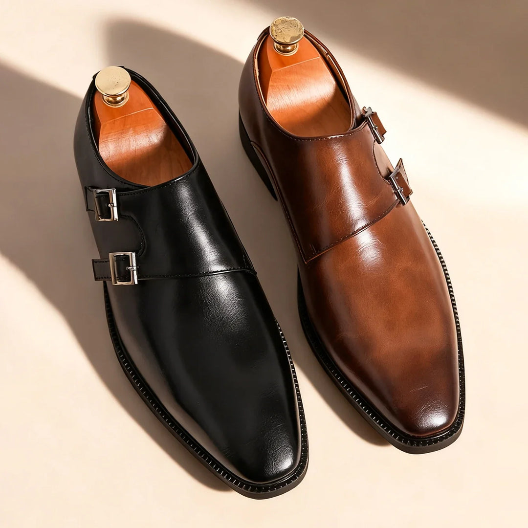 Back view of comfortable Valmont men's loafers. Classic buckle design, ideal formal footwear.