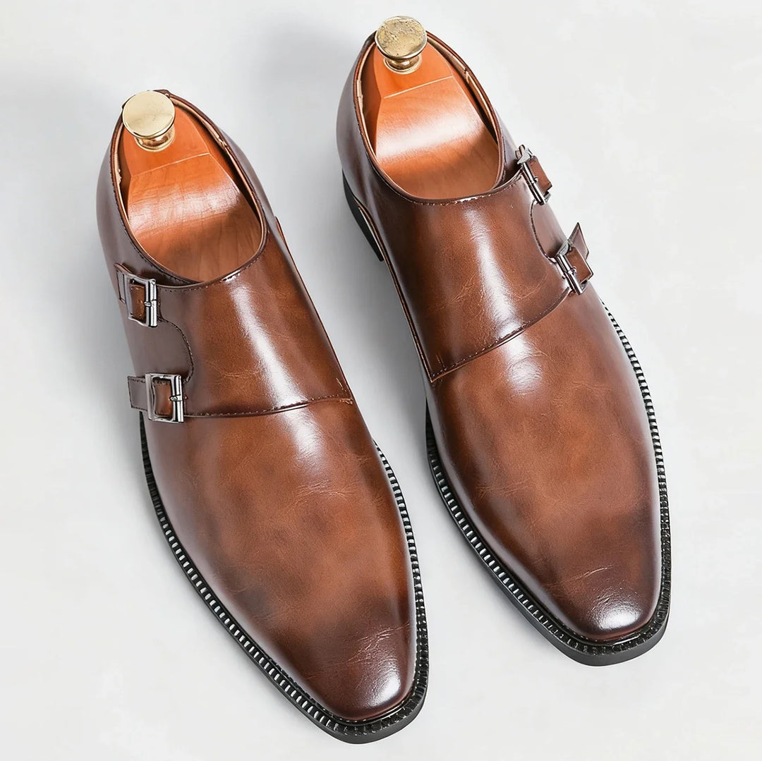 Side profile of brown Valmont classic loafers, showcasing comfortable design and double buckles.