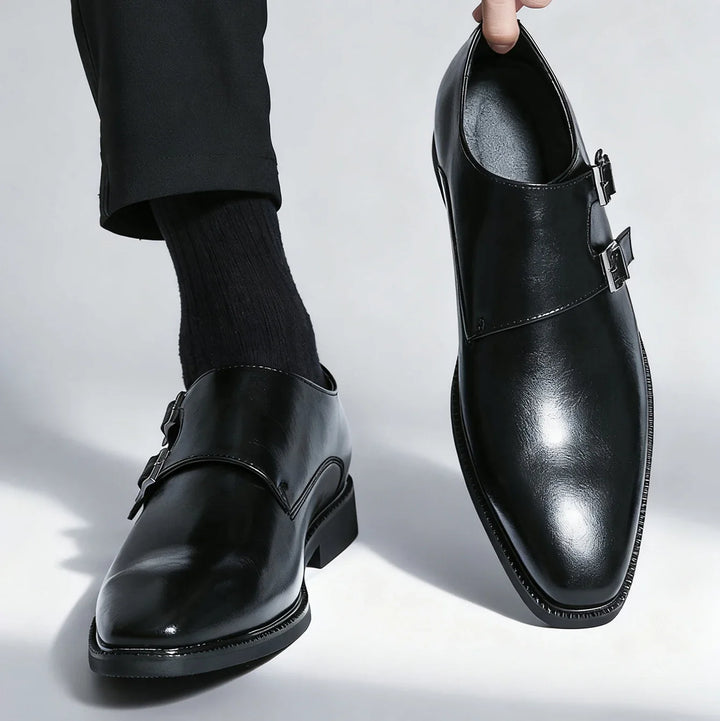 Detail shot of the quality leather texture on Valmont double buckle men's loafers. Comfortable footwear.