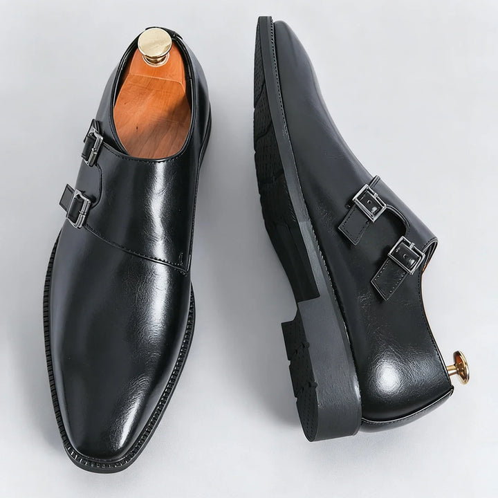 Top-down view of black Valmont loafers, a versatile slip-on shoe for mens fashion & comfort.