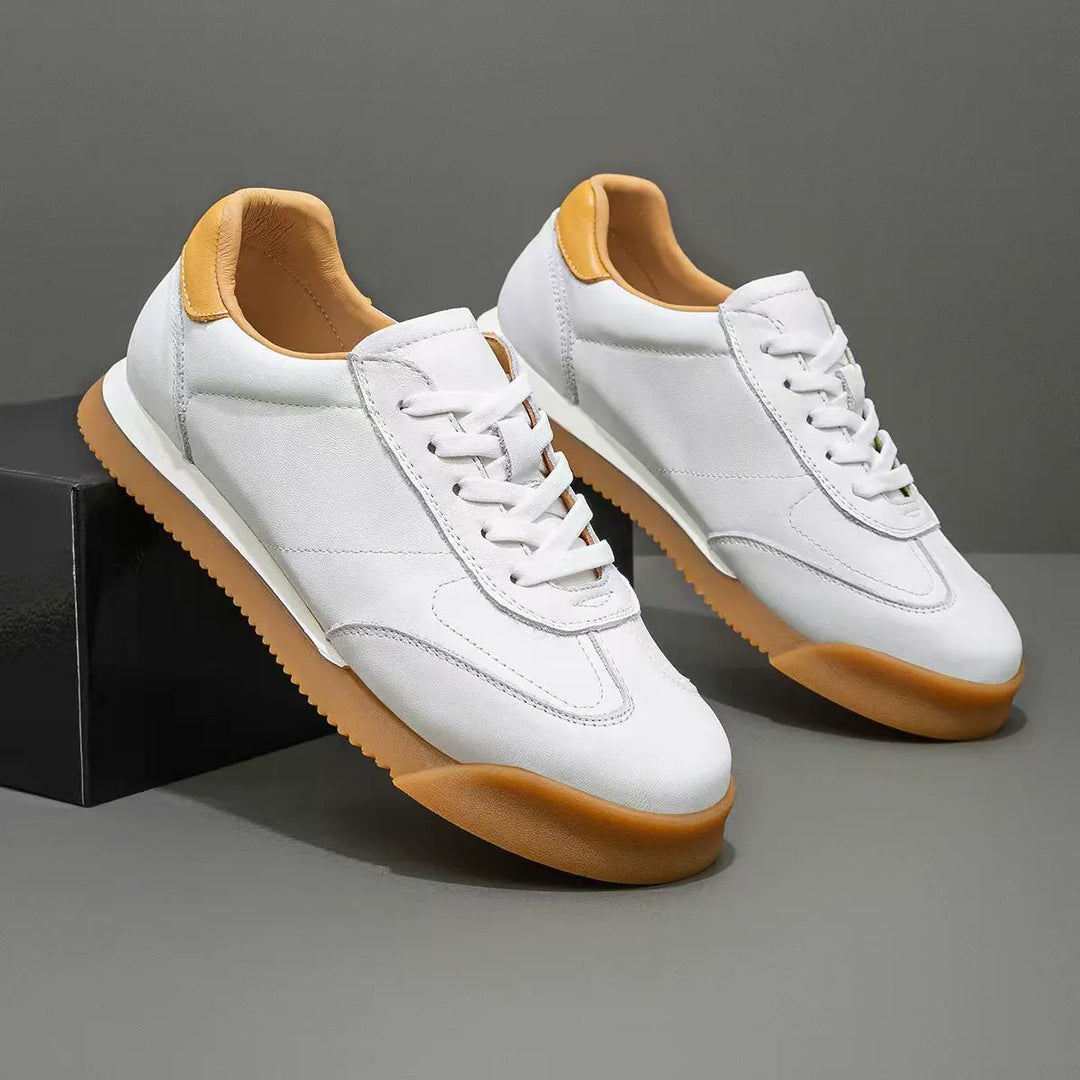 Genuine leather men's classic lifestyle sneaker. Comfortable & stylish casual shoe.