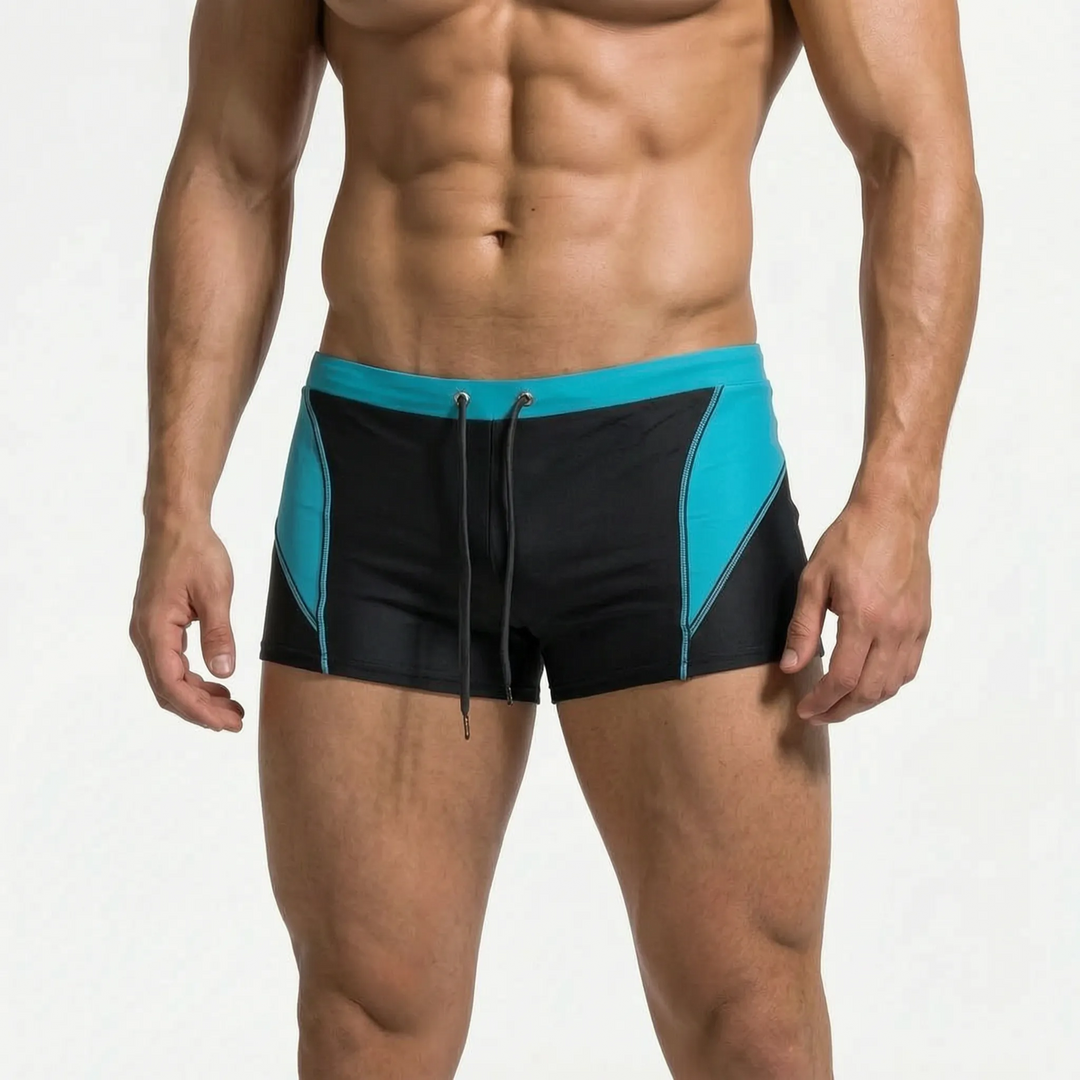 Secure fit men's color block boxer swim trunks, made with quick-dry fabric for ultimate comfort.