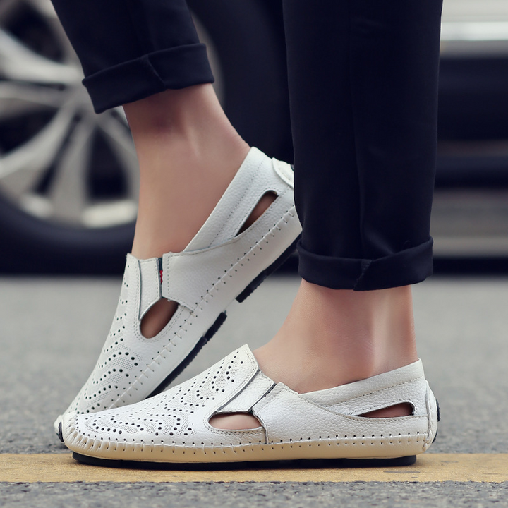Enjoy all-day comfort with men's adjustable strap sandals. Perfect for casual summer wear & walking.