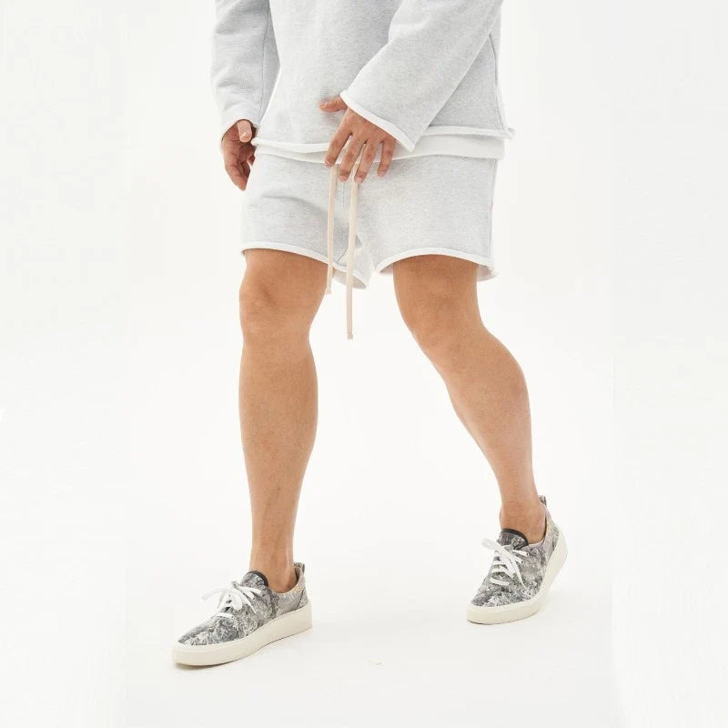 Men's performance training shorts, designed for athletic comfort and gym versatility.