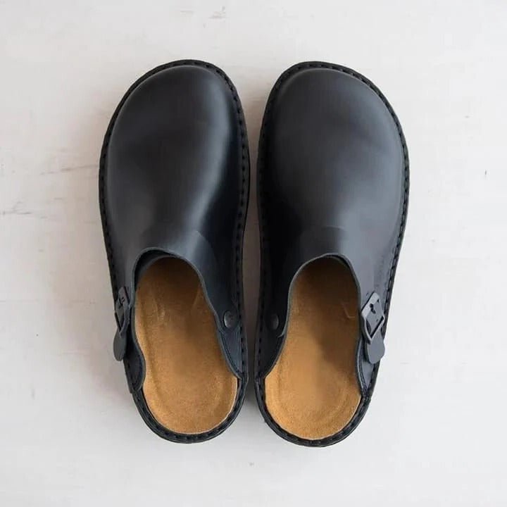 Casual men's mules, slip-on style with a supportive heel strap, designed for ultimate comfort.