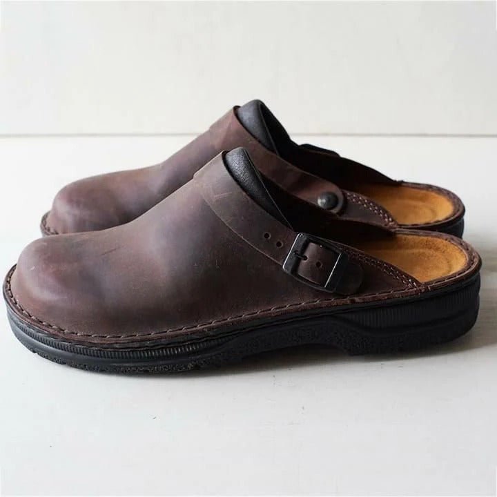 All-season men's footwear: comfortable slip-on mules with an adjustable heel strap for secure fit.