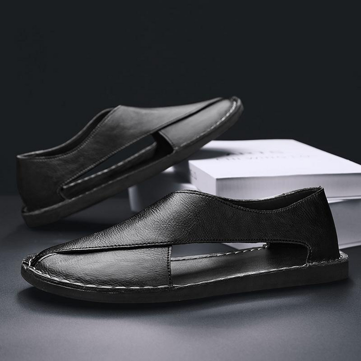 Dynamic shot of men's walking sandals, emphasizing flexibility & crossover design.