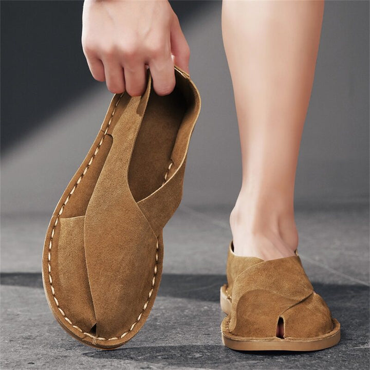 Stylish men's slip-on summer sandals, featuring a comfortable cross-wrap design.