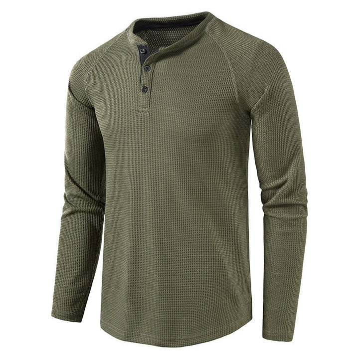 Stylish men's knit henley shirt featuring a button placket, perfect for versatile fashion.
