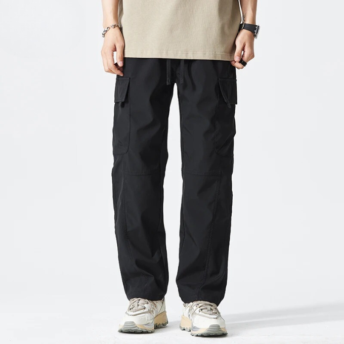 Versatile men's outdoor cargo pants, durable & comfortable for adventure or daily use.
