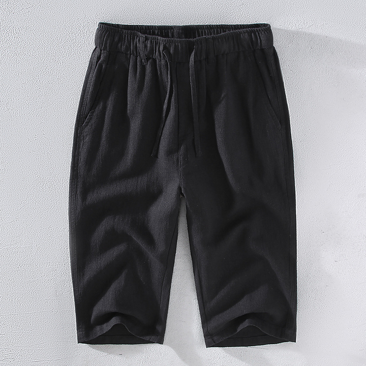Men's casual beach shorts with adjustable drawstring, great for vacation and warm weather essentials.