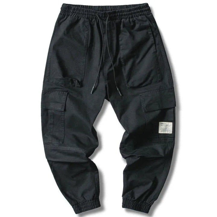 Versatile men's tapered joggers, comfortable for athletic activities, casual outings, or relaxing loungewear. Cotton blend.