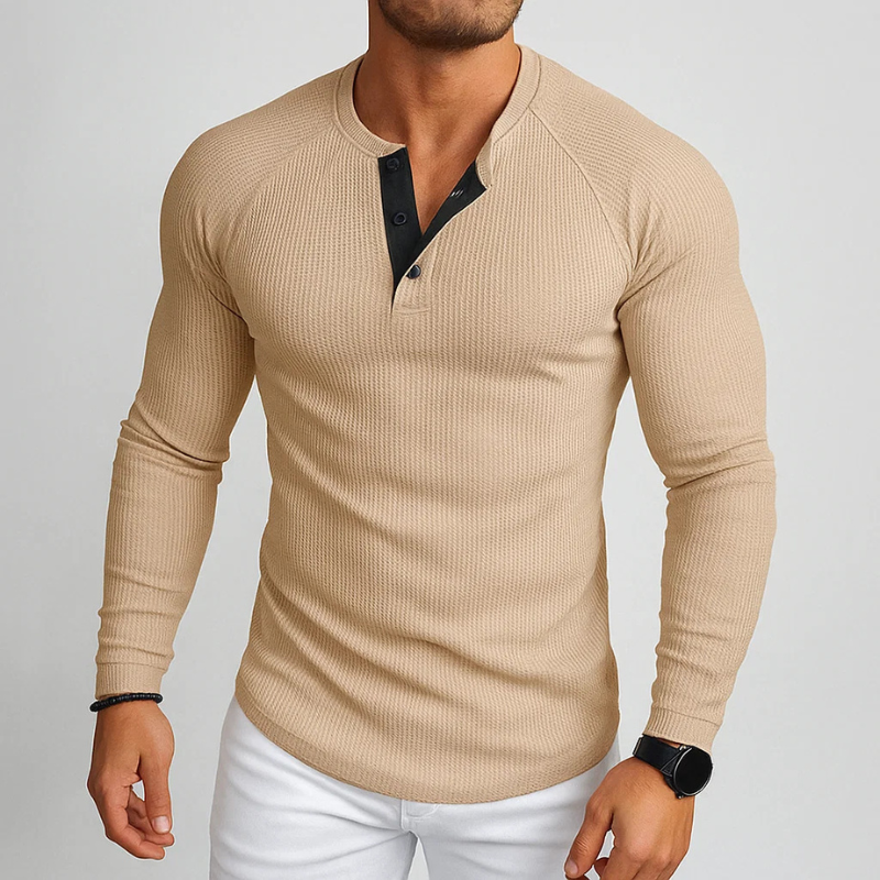 Close-up of a men's everyday textured Henley long sleeve shirt, highlighting its unique fabric & comfortable feel.