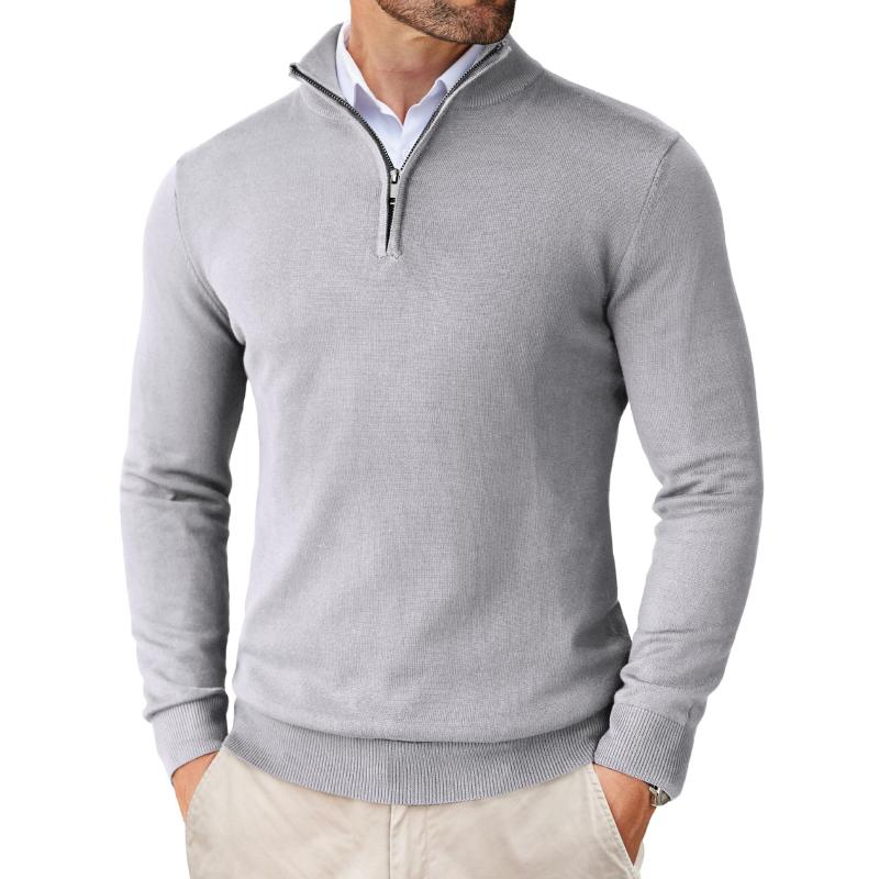 Tailored fit men's quarter zip knit sweater, breathable cotton merino for a comfortable, versatile winter fashion.