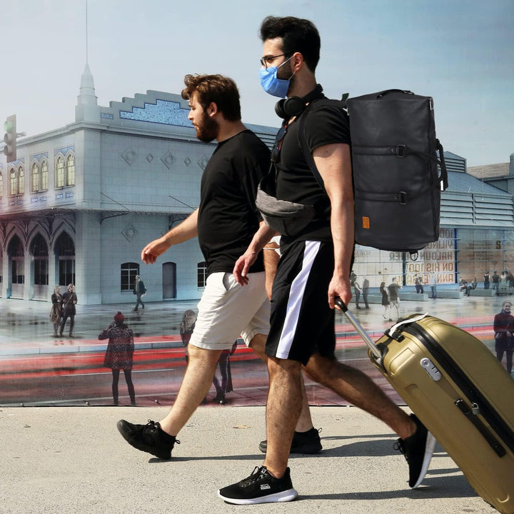 Men's weekender bag with detachable shoulder strap, offering comfort for carry-on travel.