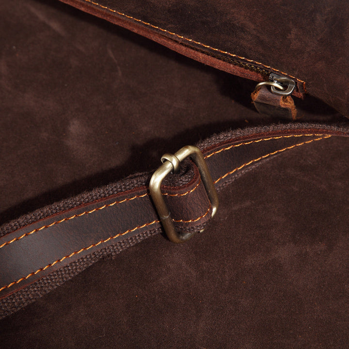 Adjustable shoulder strap of the Cooper men's genuine leather crossbody bag, built for comfort.