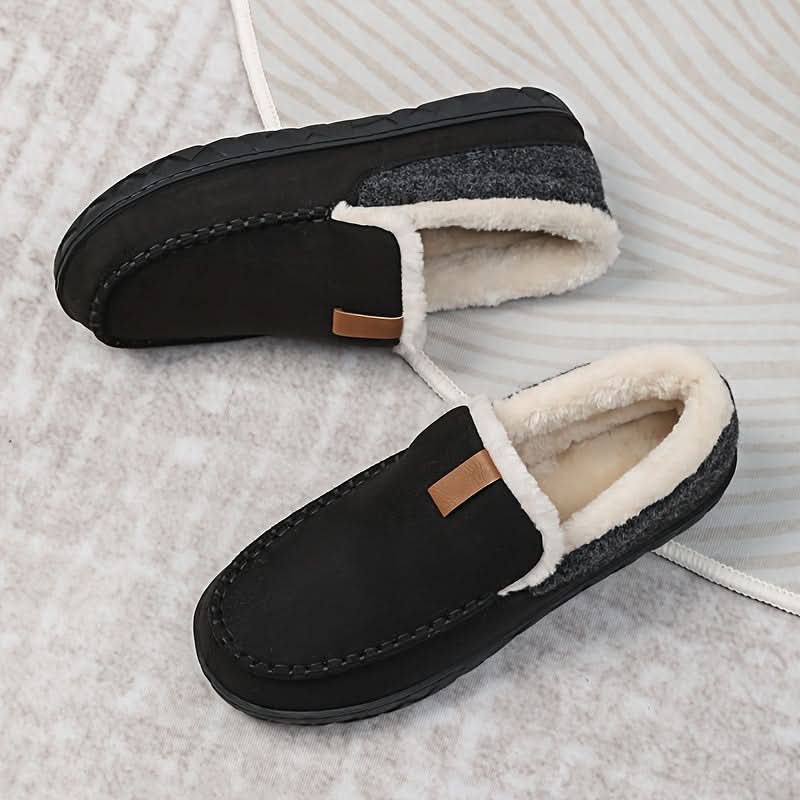 Men's cozy slip-on house slippers for ultimate warmth and comfort at home.