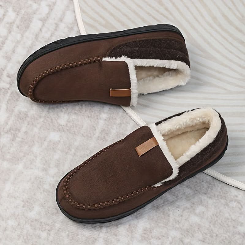 Plush-lined men's house slippers, offering ultimate warmth and an easy slip-on fit.