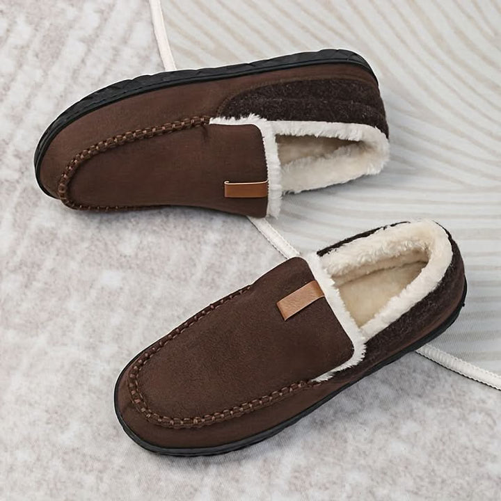 Plush-lined men's house slippers, offering ultimate warmth and an easy slip-on fit.