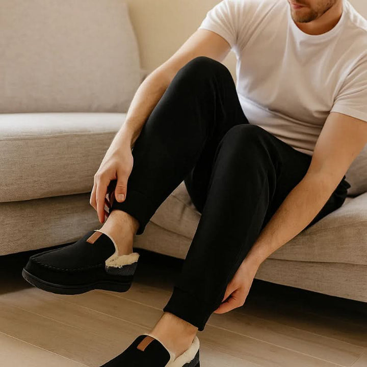 Comfortable men's indoor loafers with an easy slip-on design for home wear.