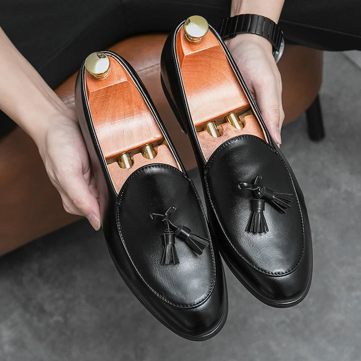 Sophisticated men's footwear: Crescent Tassel Loafers, blending classic design with modern comfort.