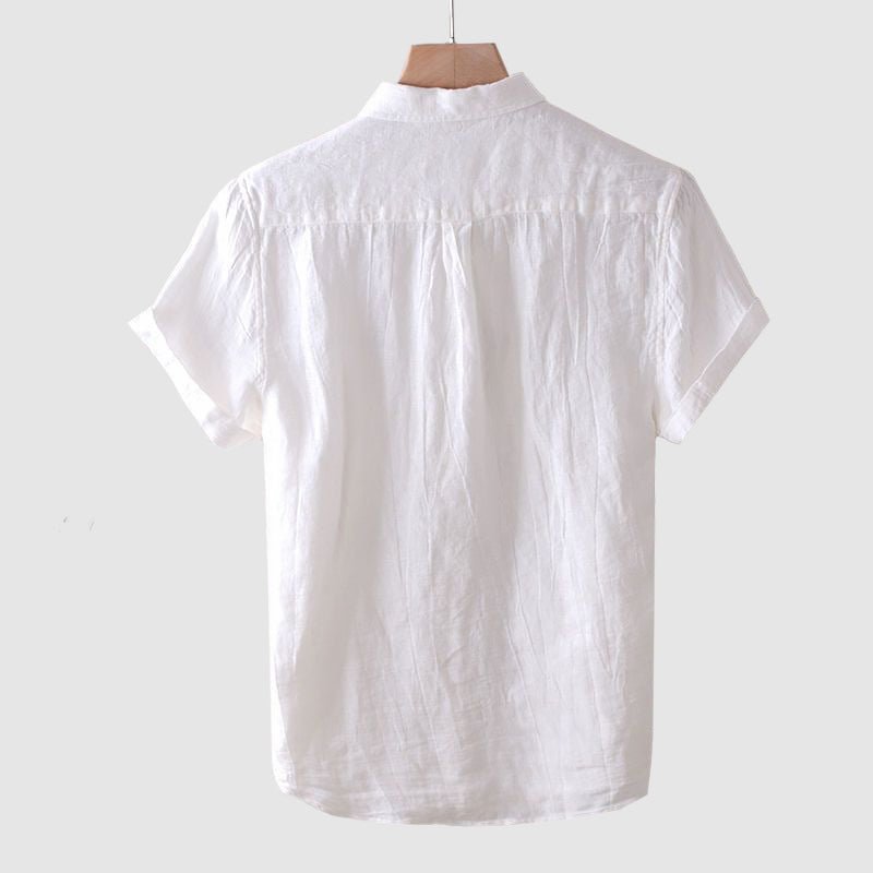 Side view of a men's casual crinkle short sleeve shirt, featuring a relaxed fit for comfortable movement & style.