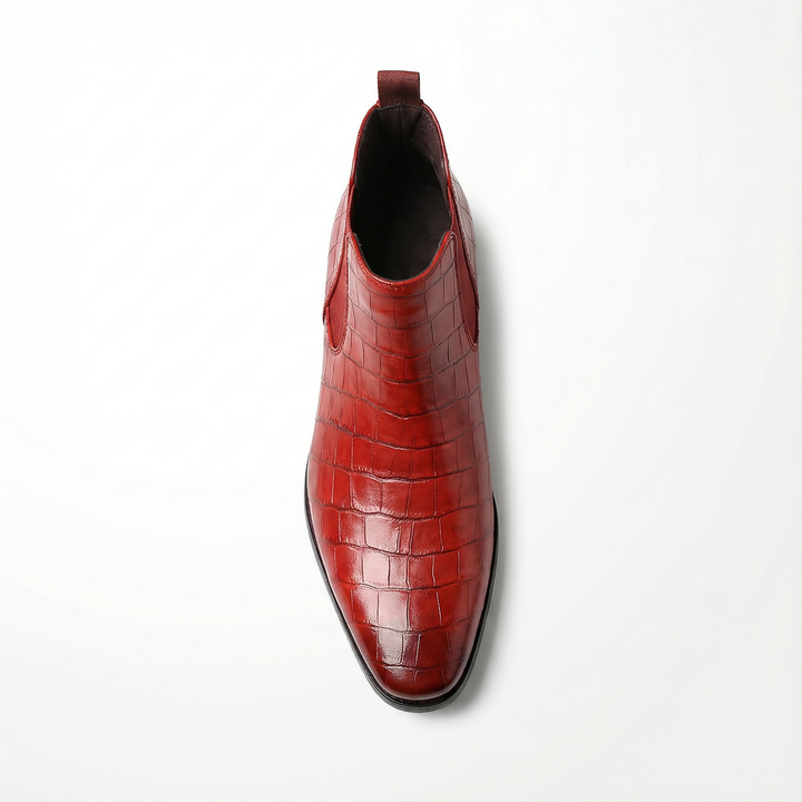 Front view of premium genuine leather men's Chelsea boots, highlighting craftsmanship and elegant toe.