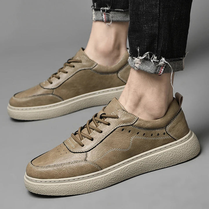 White men's genuine leather casual sneakers. Comfortable, minimalist, and perfect for everyday wear. Quality footwear.