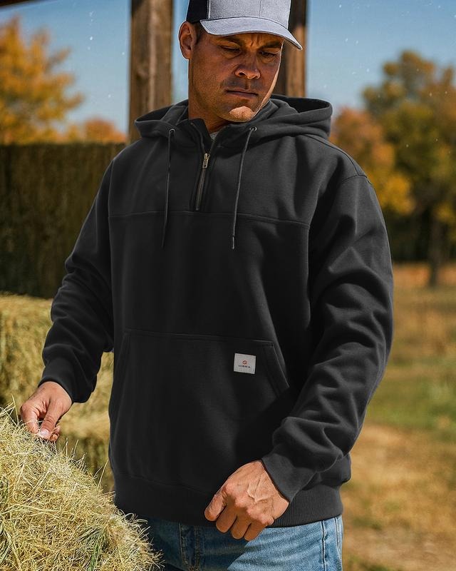 Protect yourself with this men's water-resistant work hoodie. Features a half-zip & adjustable hood for all-weather comfort.
