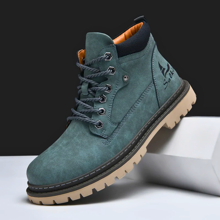 Men's durable hiking ankle boots with robust traction for challenging outdoor environments.
