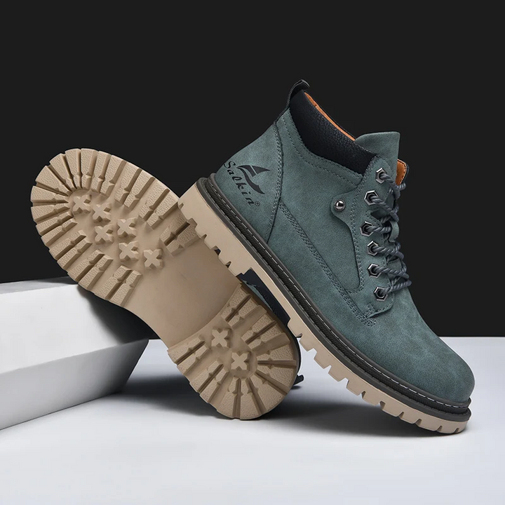 Rugged mens footwear: durable ankle boots with superior grip for outdoor and casual wear.