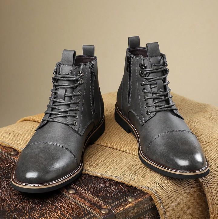 Durable men's outdoor boots, ideal for hiking and varied terrains, offering comfort & robust support.