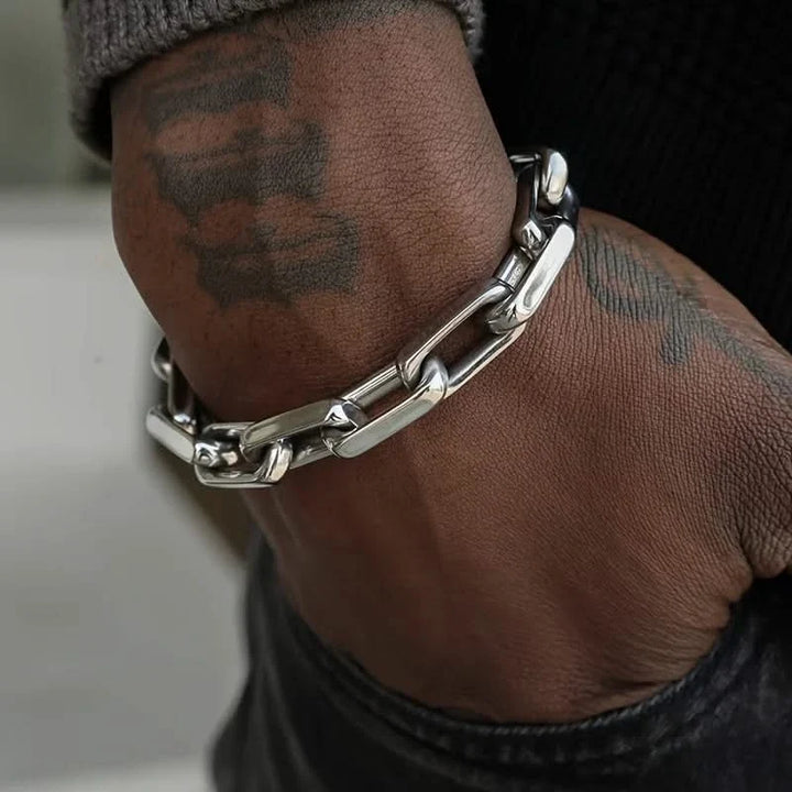 Men's durable stainless steel chainlink bracelet with sleek toggle clasp. A stylish and lasting accessory.