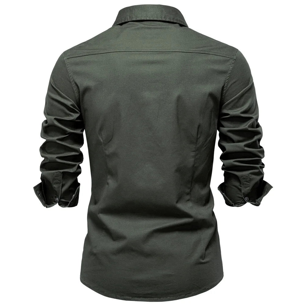 Durable men's utility shirt, long sleeve, button-up, essential for work and casual fashion.